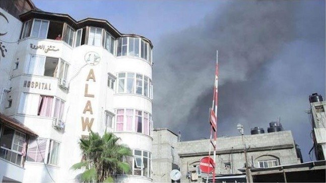 مستشفى العودة بغزة يطالب  بتدخل دولي لإخماد حريق بمستودع الأدوية